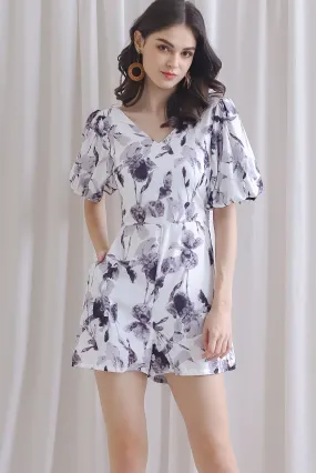 Poppie Puffy Sleeve Bow Back Romper In Mono Floral